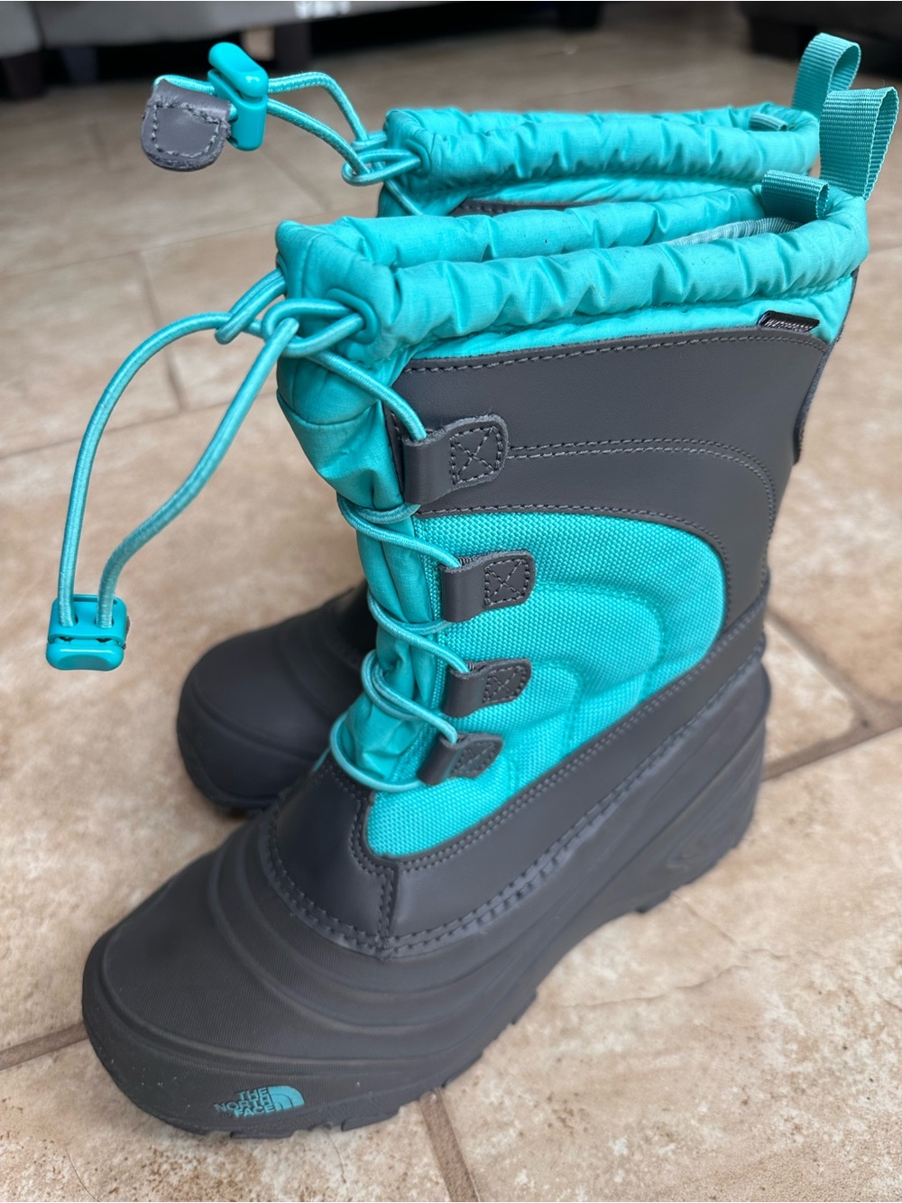 The North Face Kids Teal and Gray Snow Boot with Adjustable Bungee